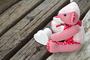 bear doll on wood