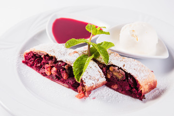 strudel  with jam and ice cream cold 