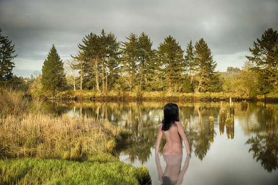 3d computer rendered illustration of a beautiful young woman skinny dipping