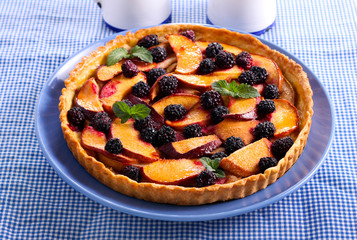 Fruit and berry tart on plate