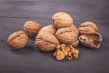 Walnuts isolated on a wooden table