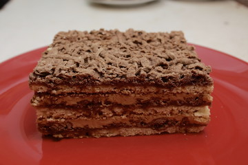 piece of cake on a red plate