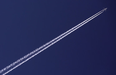 Plane leaves trail