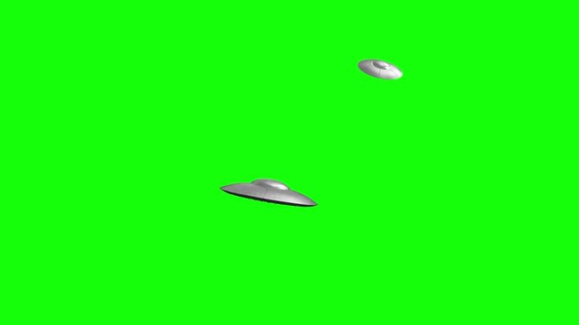 3d rendered animation of flying saucers on green screen