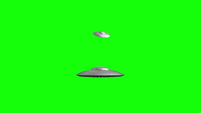 3d rendered animation of flying saucers on green screen