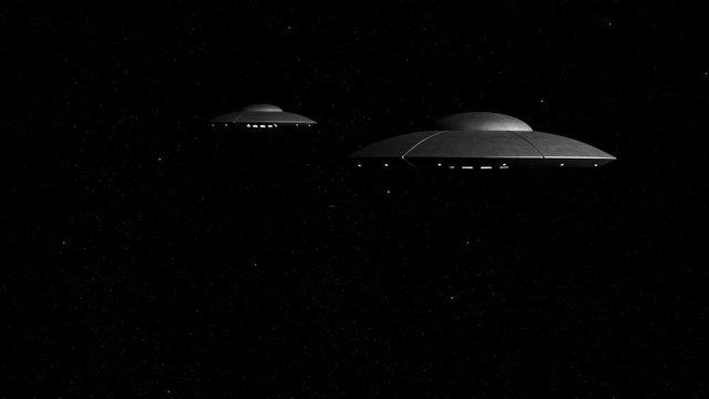 3d rendered animation of flying saucers on stars background