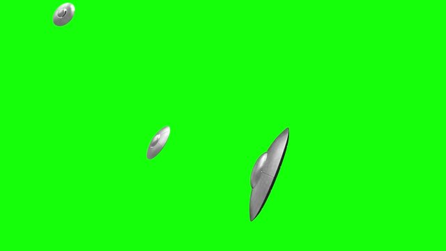3d rendered animation of flying saucers on green screen