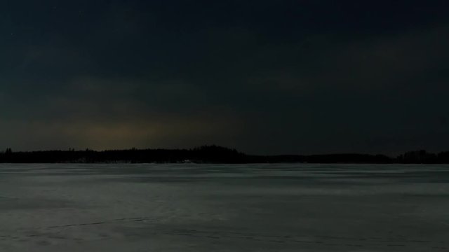 Night-time ice sailing lights time-lapse shot