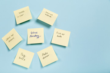 Blue Monday! - The most depression day of the Year. Yellow sticky stickers notes post-it. - 133255215