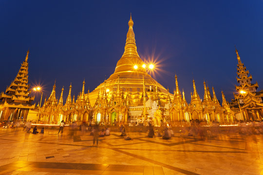 Golden temple in Yangon Shwedagon Pagoda at sunset 