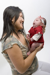 Mother and newborn baby isolated on white