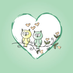 Two owls on the tree 