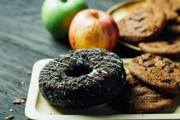 donuts with cookies and apple