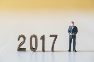 business miniature people with new year 2017