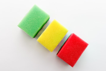 Dishwashing sponges on a white background