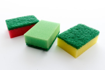 Dishwashing sponges on a white background