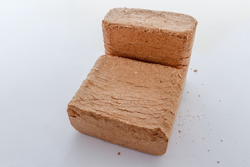 Wood briquettes isolated on white background