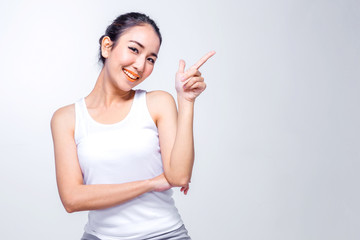 Beautiful young asian woman thinking on white background