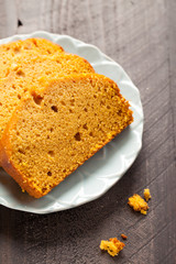 Close up of Homemade Pumpkin Bread slices on top of blue plate 