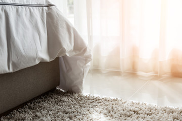 beige color domestic carpet texture with light spot from window