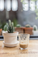 single empty glass of coffee espresso cup close up on the wooden