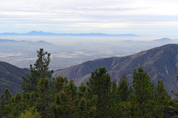 View of pollution and smog over Los Angeles, with mountains in foregound, California