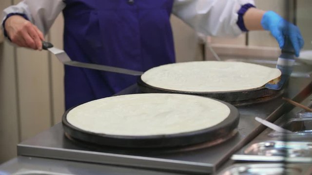 Process of pancake turning on one side to other