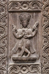 Plakat Detail wooden carved door in hindu temple, Kathmandu, Nepal background. Close up