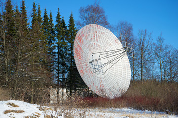Radio telescope antenna close up in the sunny February afternoon. Pulkovo astronomical Observatory...