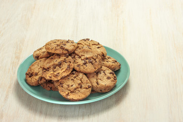 Chocolate chips cookies on plate with copyspace