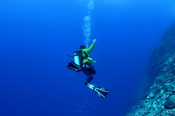 Scuba Diver Hanging on a Thread