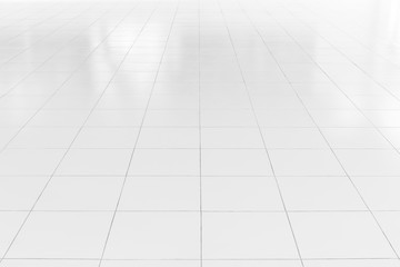 White tile floor background in perspective view. Clean, shiny, symmetry with grid line texture. For decoration in bathroom, kitchen and laundry room. And empty or copy space for product display also. - obrazy, fototapety, plakaty