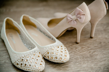 wedding shoes for bride beautiful standing in the background