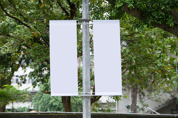  Large blank billboard on a street wall,  banners with room to add your own text