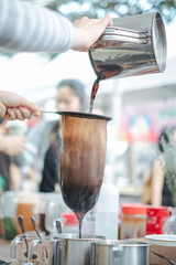 Fototapeta na wymiar make old coffee bag , pot With tool . Street food and drink Thailand .