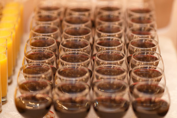 Many glasses of red wine.