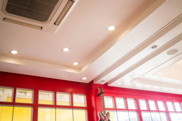 Colonial building with red window