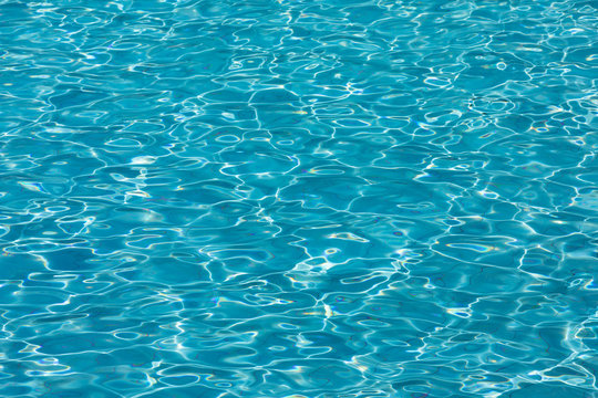 texture of clean water in the pool on a sunny day