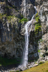 Fototapeta premium Casset waterfall in the Valgaudemar Valley in summer. Ecrins National Park, Hautes Alpes, France