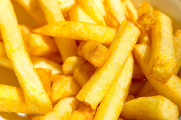 Golden French fries potatoes ready to be eaten