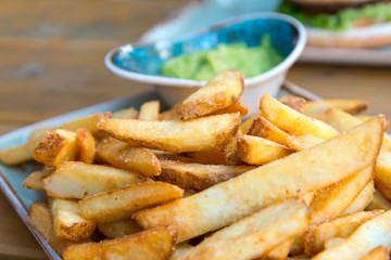 Golden French fries potatoes ready to be eaten