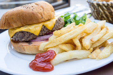 Cheese burger - American cheese burger with Golden French fries