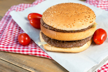 delicious American cheese burger with tomato