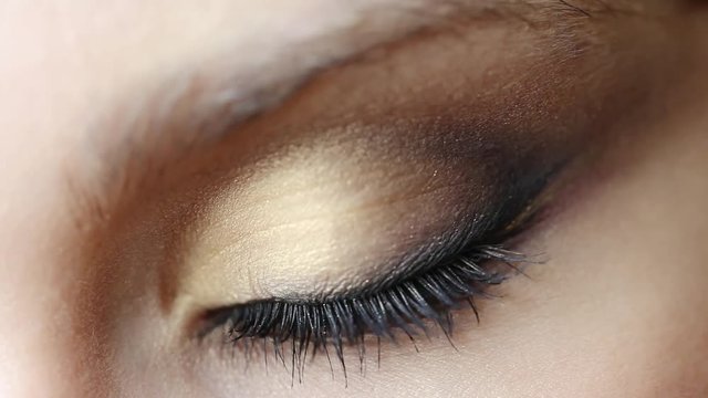 Closeup video of woman eye with day makeup