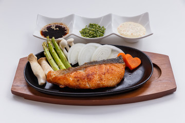 Grilled Japanese Salmon Steak with Mushroom, Asparagus, Sliced Onion and Carrot with Soy Sauce. Scallion Sauce and Mayonnaise.
