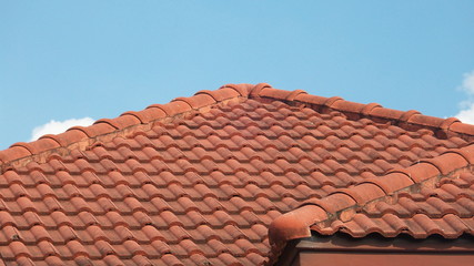 Close-up to the roof and blue sky