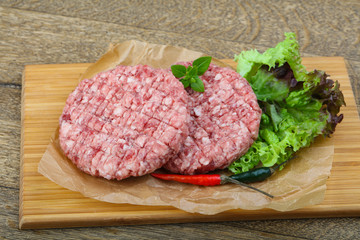 Raw burger cutlet