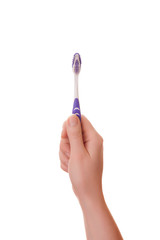 Woman hand holding a toothbrush 