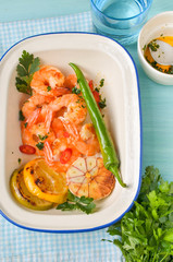 whole grain spaghetti pasta with shrimps and broccoli, top view,