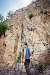 Young Climber Getting Ready For Rock Climbing